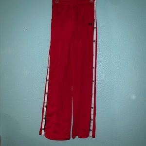 Red track pants